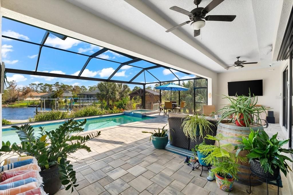 Beautifully designed lanai with a resort-style pool and spa, offering a private oasis.