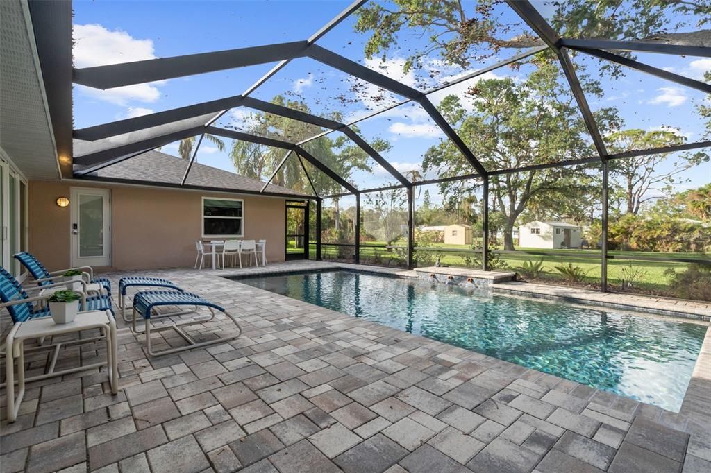 The water feature adds a focal point to the pool