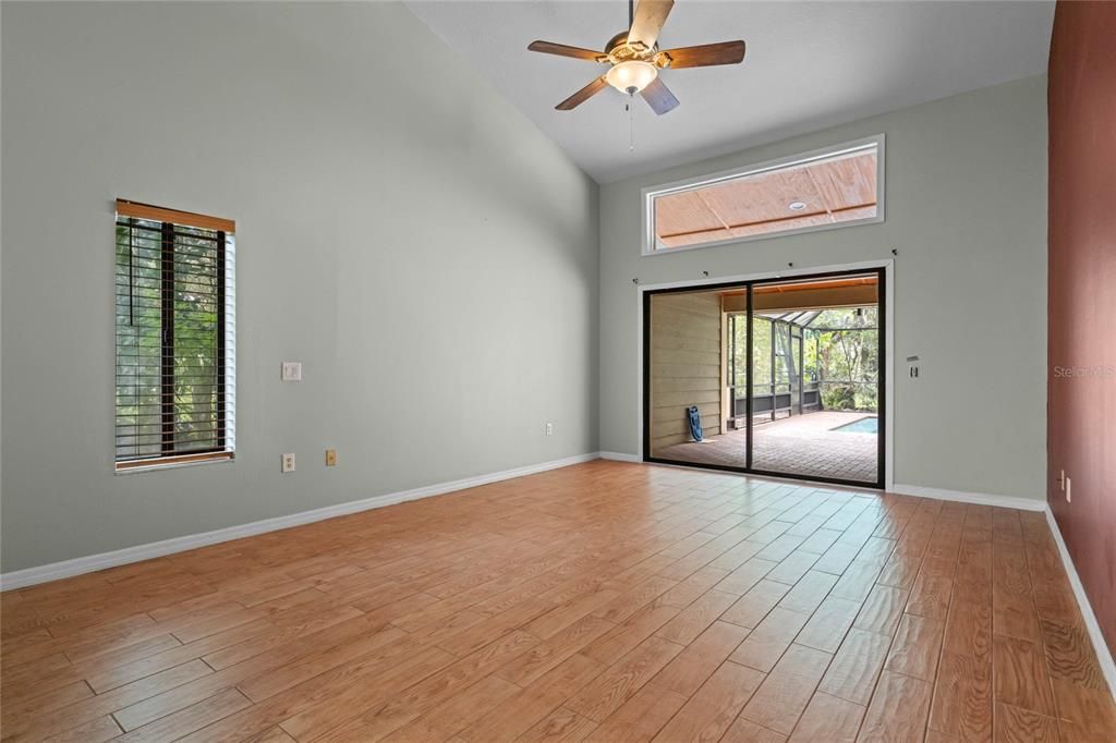 Primary Bedroom features access to the patio