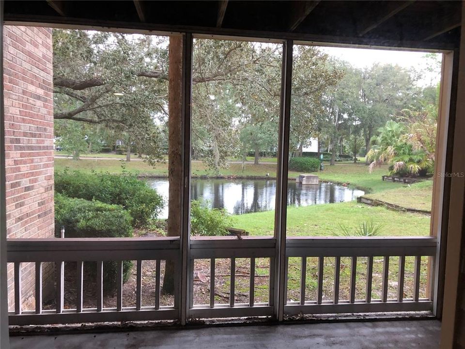 SCREENED PATIO WITH LAKE VIEW