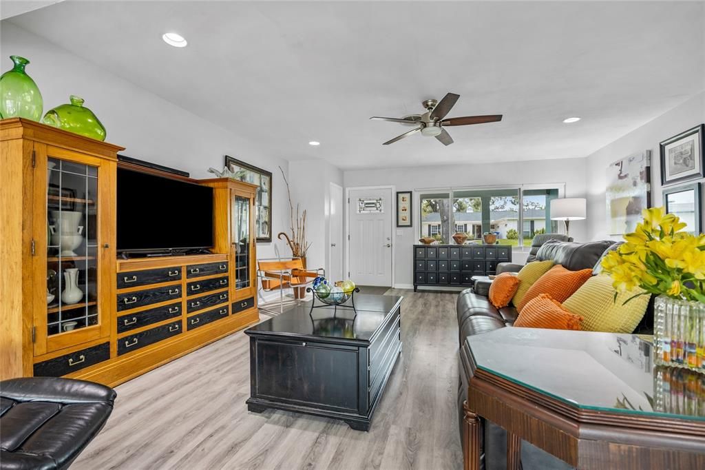 This Dining Room with its massive windows will be the perfect place to enjoy meals with a view of the back yard and also a peak view down to Lake Saundra!