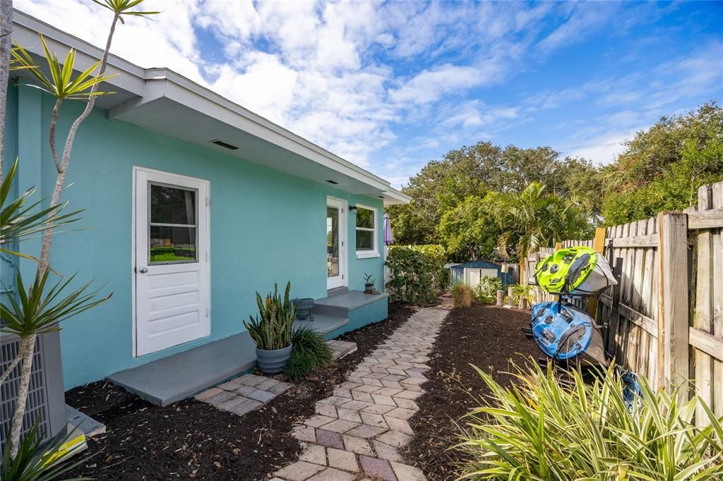 This aerial view of the home shows the proximity to the Dunedin Causeway which is the gateway to Honeymoon and Caladesi Island State Parks just a short bike ride away.   Also shown is Lake Saundra, at the heart of Fairway Estates.