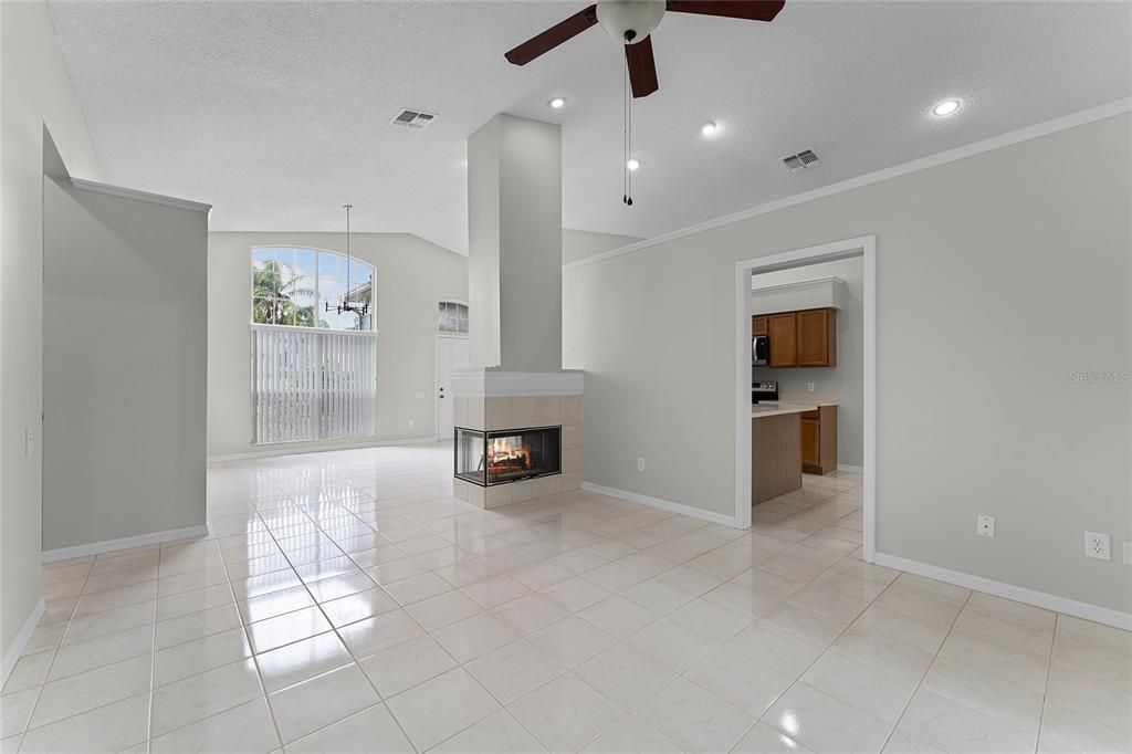 Living room & dining with wood burning fireplace