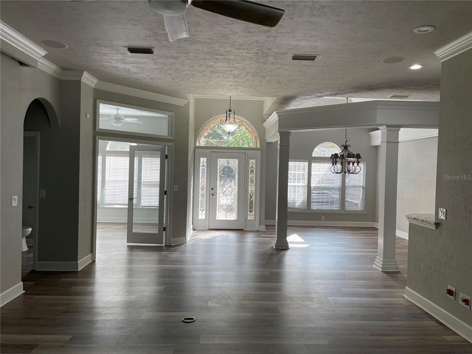 entryway/office/formal dining area