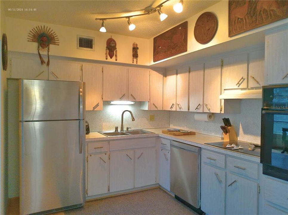 Fully appointed kitchen with all dishes, cutlery and utensils.