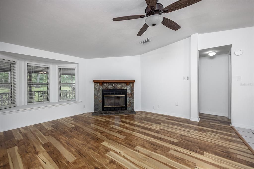 Living Room with Wood Burning Fireplace