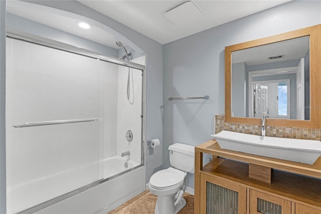 Guest bathroom with tub