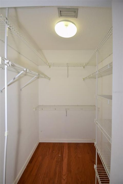 Large his and her walk-in closets.