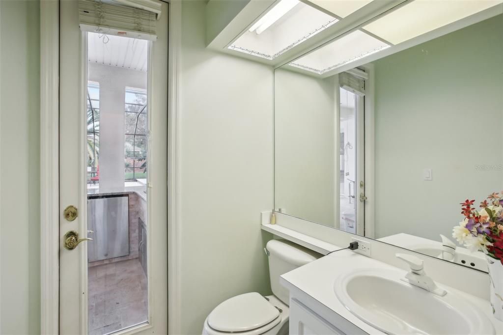 Powder room is easily assessable from pool area.