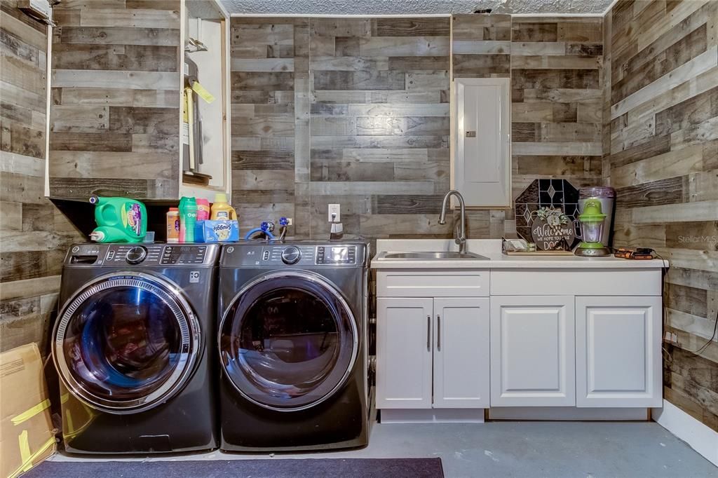 Charming laundry nook in garage