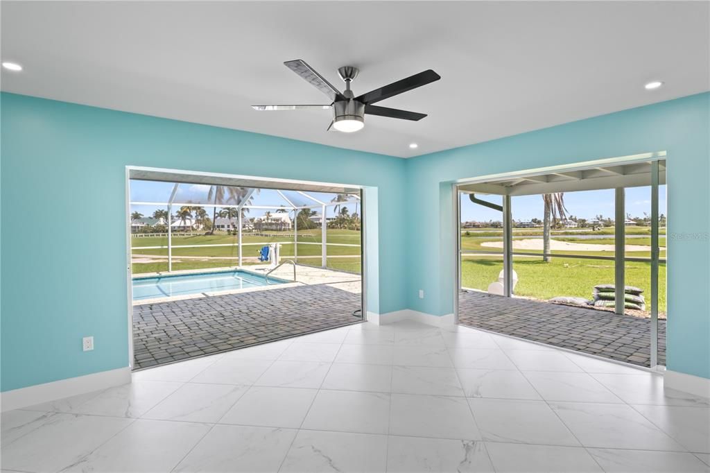 Dining area with full sliders to extend both the indoor and outdoor living space!