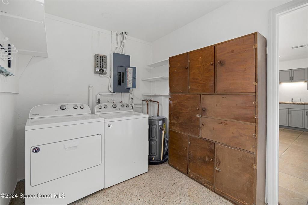 Laundry room with cabinets