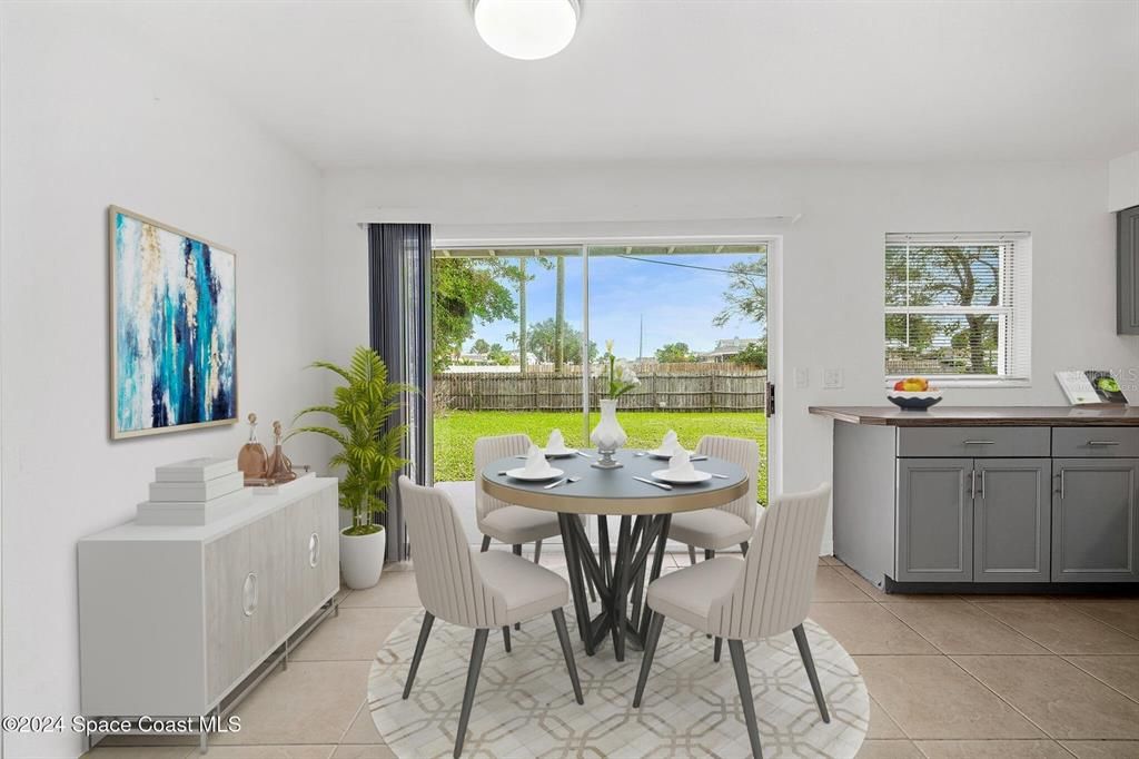 Virtually staged dining area off kitchen