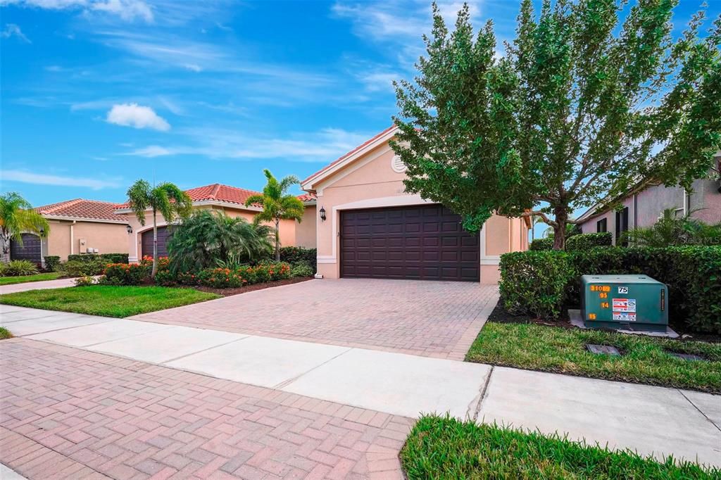 View of front of property with a garage