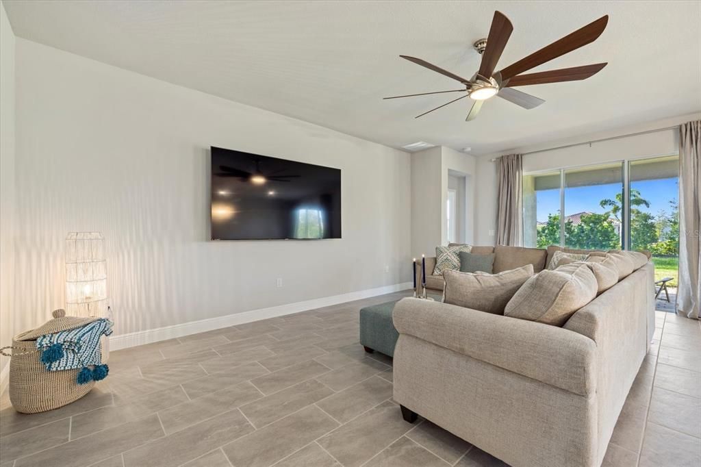 Living Room with sliding glass doors on to extended lanai