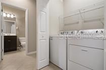 Laundry room with shelving