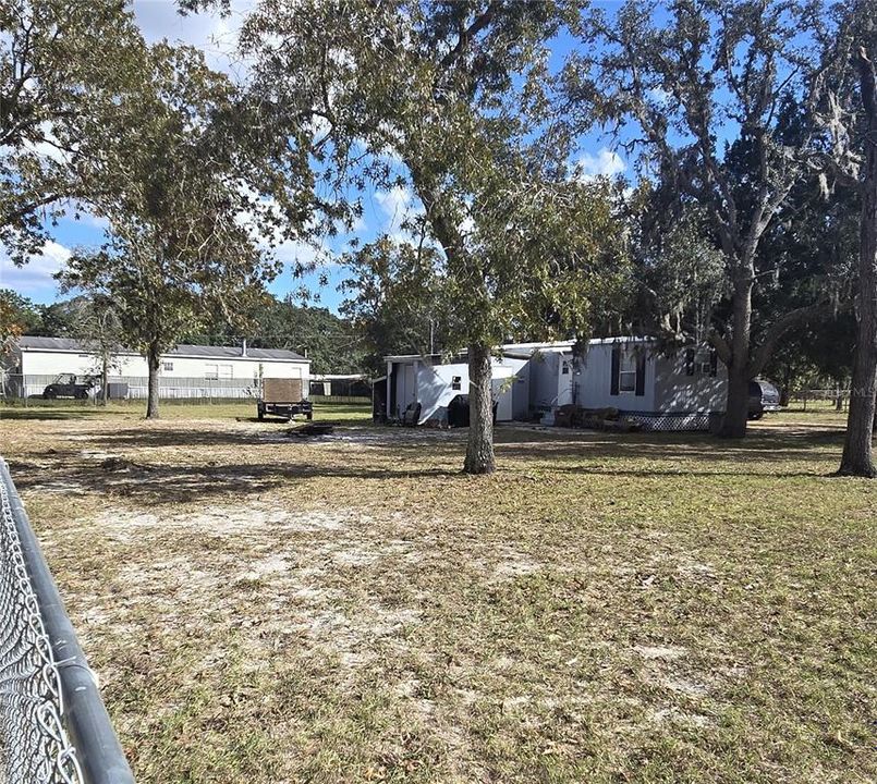 5045 S. Barker Point - Lot C - is a 3/2 single-wide manufactured home with 896 square feet and sits on .57 acres.