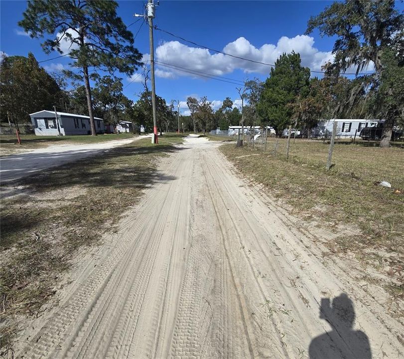 View from Woodthrush, exiting S. Barker Point (5120 is the home on the corner)