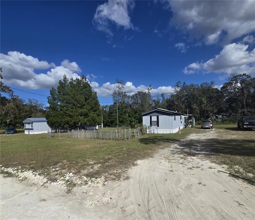 5015 S. Barker Point - Lot D - is a 3/2 single-wide manufactured home with 926 square feet and sits on .60 acres.  It's fully fenced and includes a farm gate.