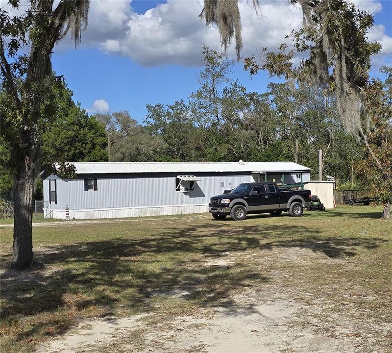 5045 (C) includes a shed for additional storage located in the backyard.