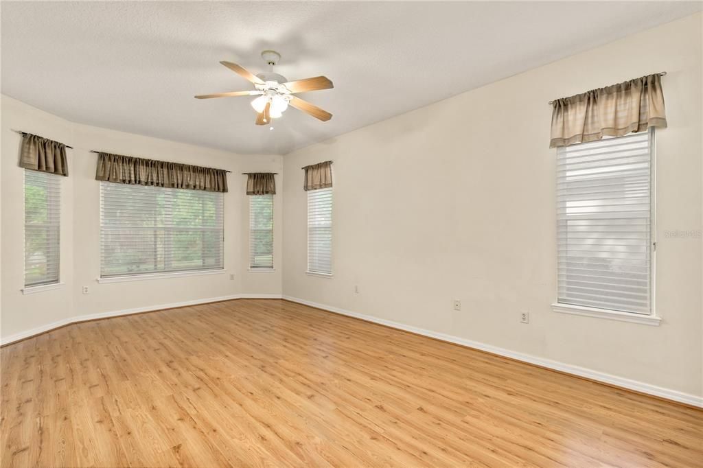 Master Suite with Bay Window views of backyard.