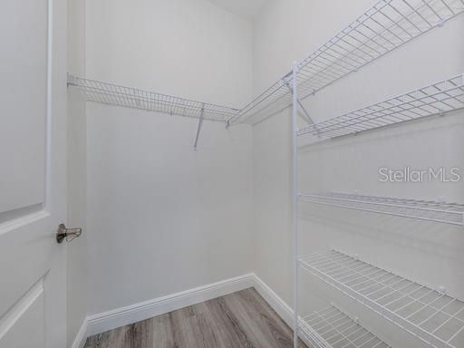 Typical Walk-in Closet in Owner's Suite