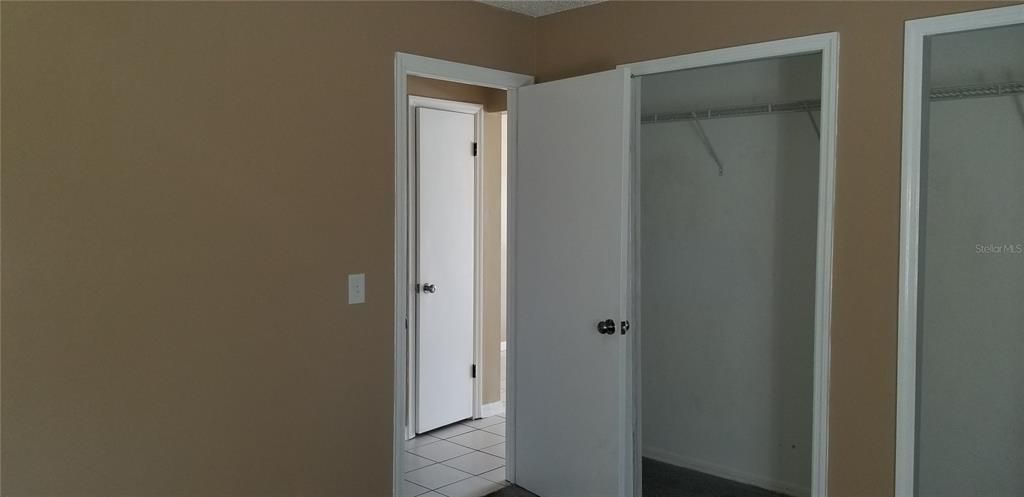 Second Bedroom with wall to wall closets.