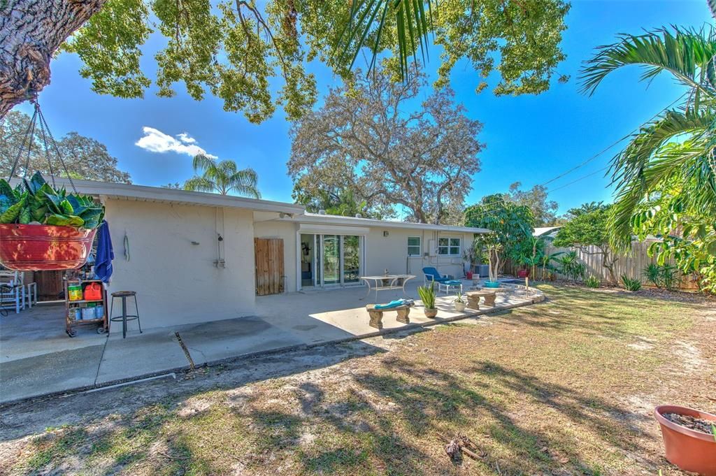 Back yard with view of the house