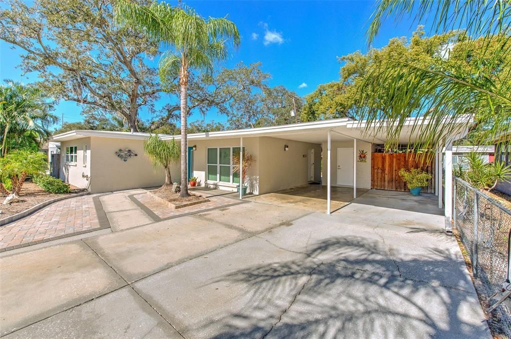 Front of Home, with beautiful paver entrance and nice double carport