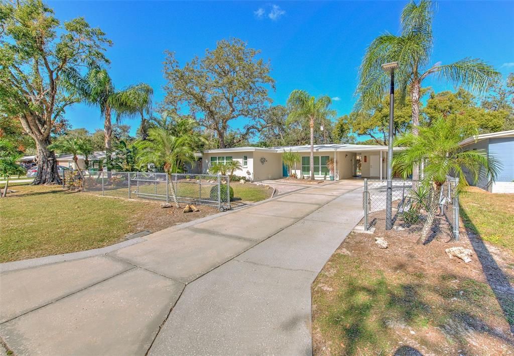 Extended driveway to home that prevents the home from being close to the street