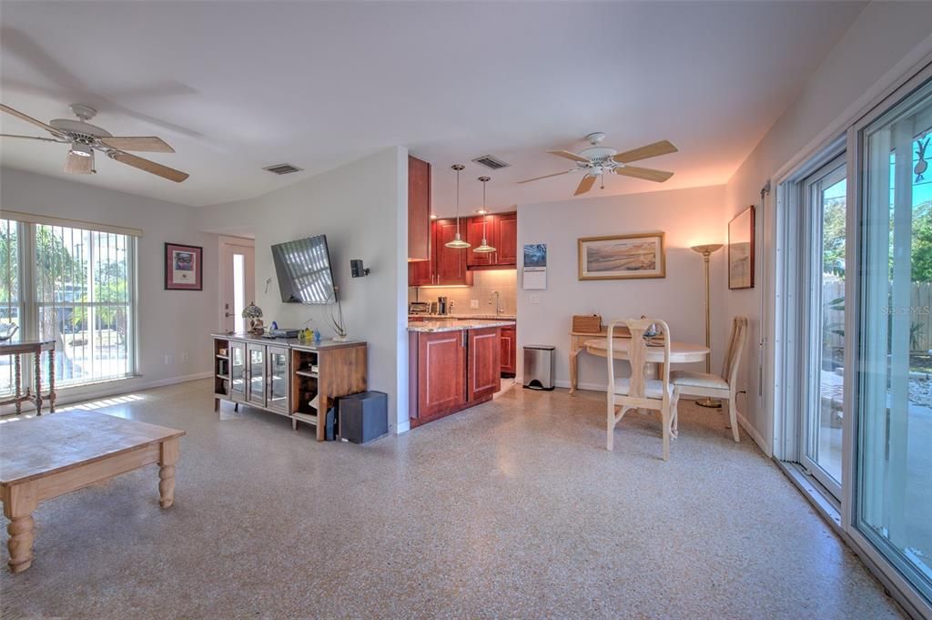 Family room with view to dining area and kitchen