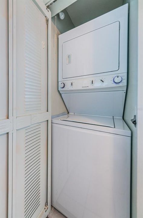 .. Laundry Area in Kitchen by Entrance Wall. Next to Fridge Area..