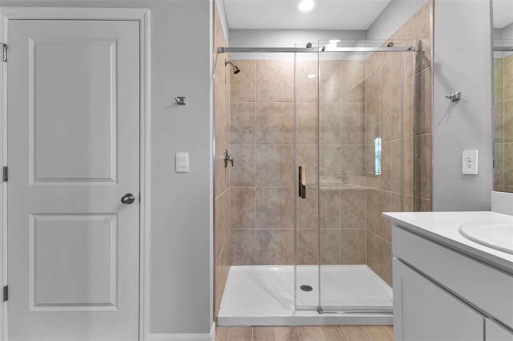 Primary Ensuite shower with additional closet