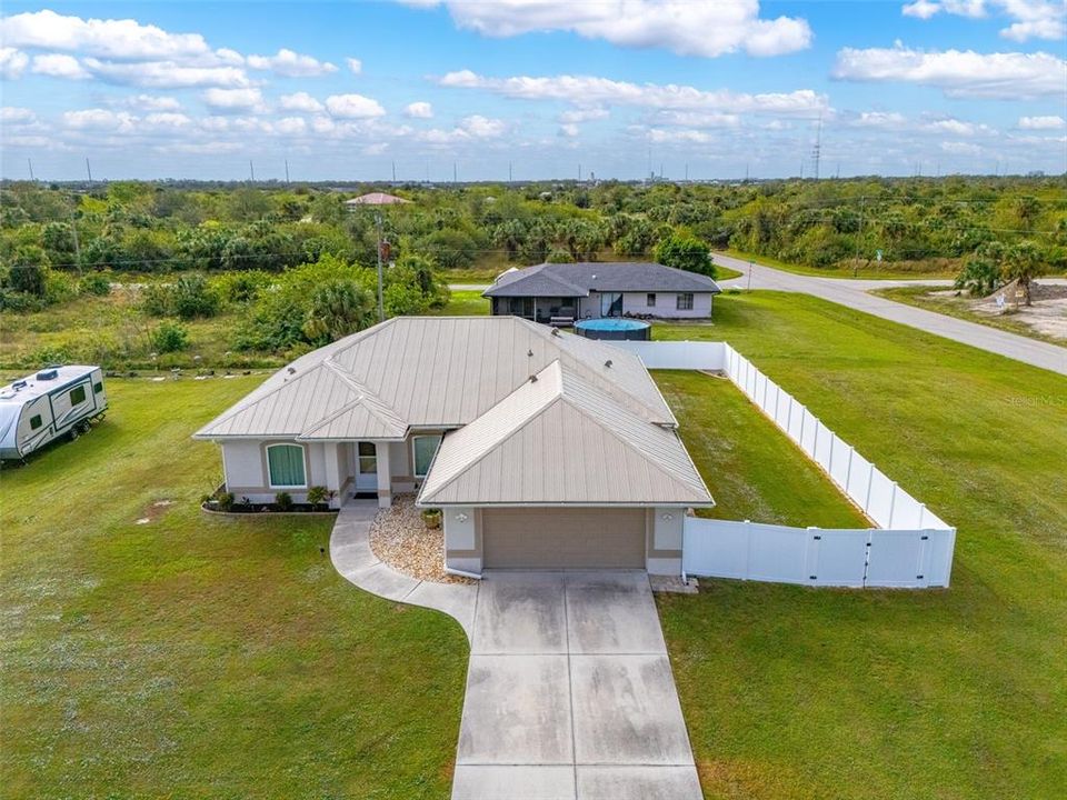 Front yard home including fence