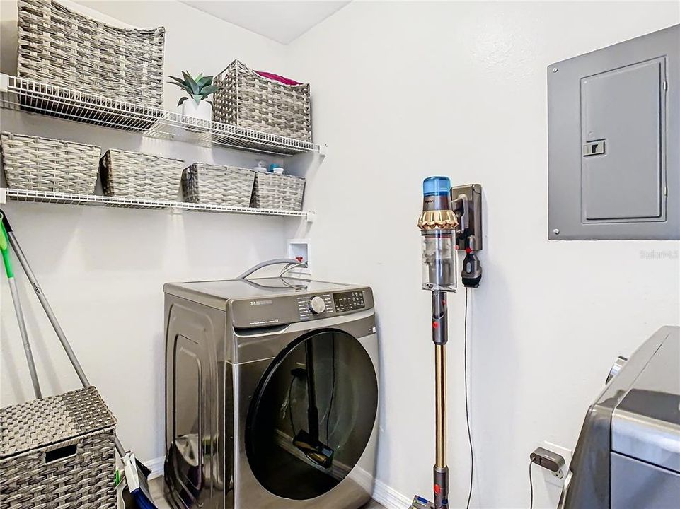 Convenient in-unit laundry featuring Samsung 2024 Smart Washer and Dryer.