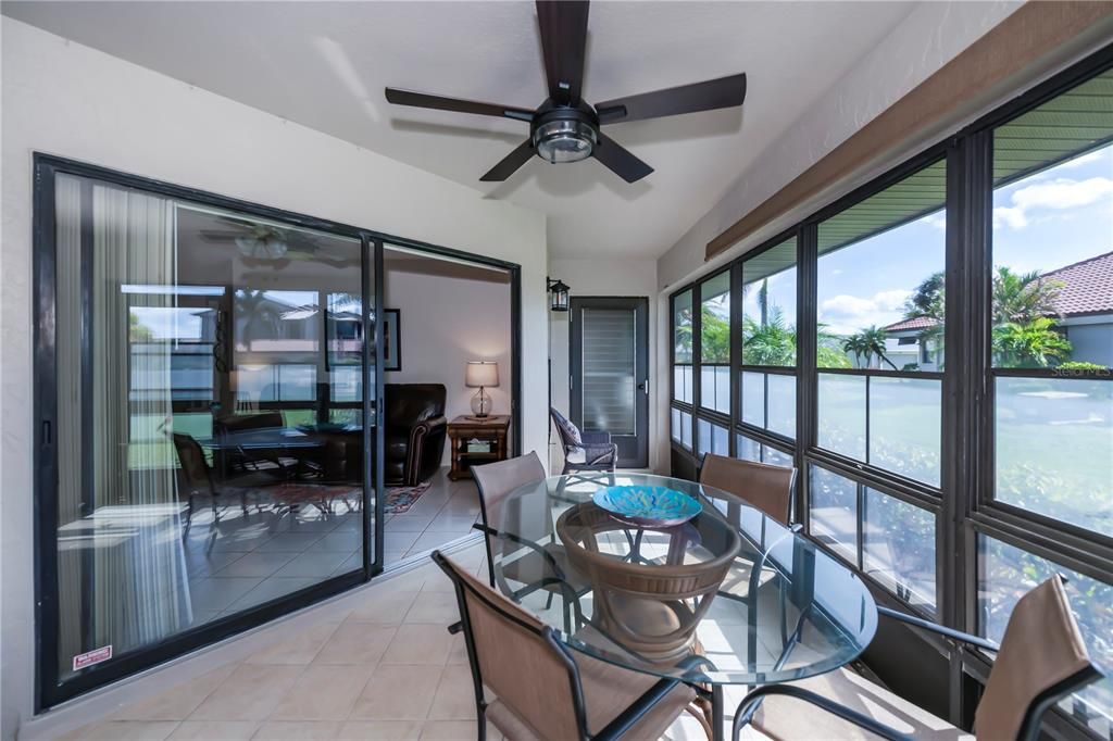 any season, this Florida room patio stays dry and breezy