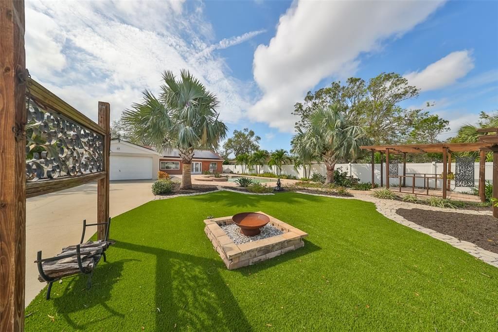 View of firepit and Gazebo in the rear garden / entertainment area