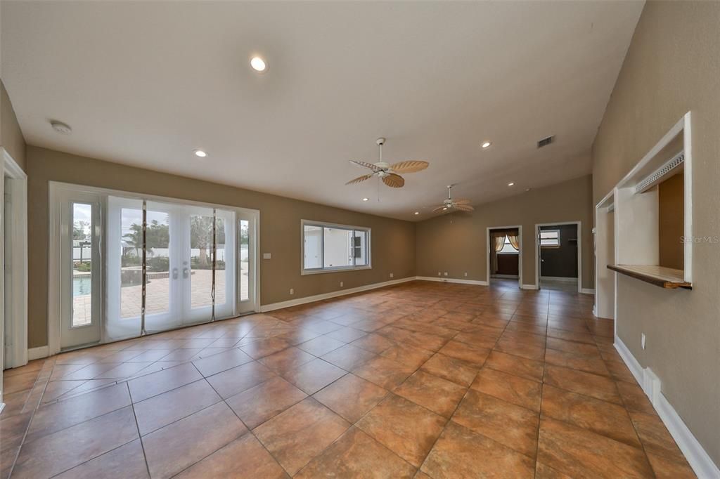 View of French Doors in the Great Room leading to the pool and entertainment area