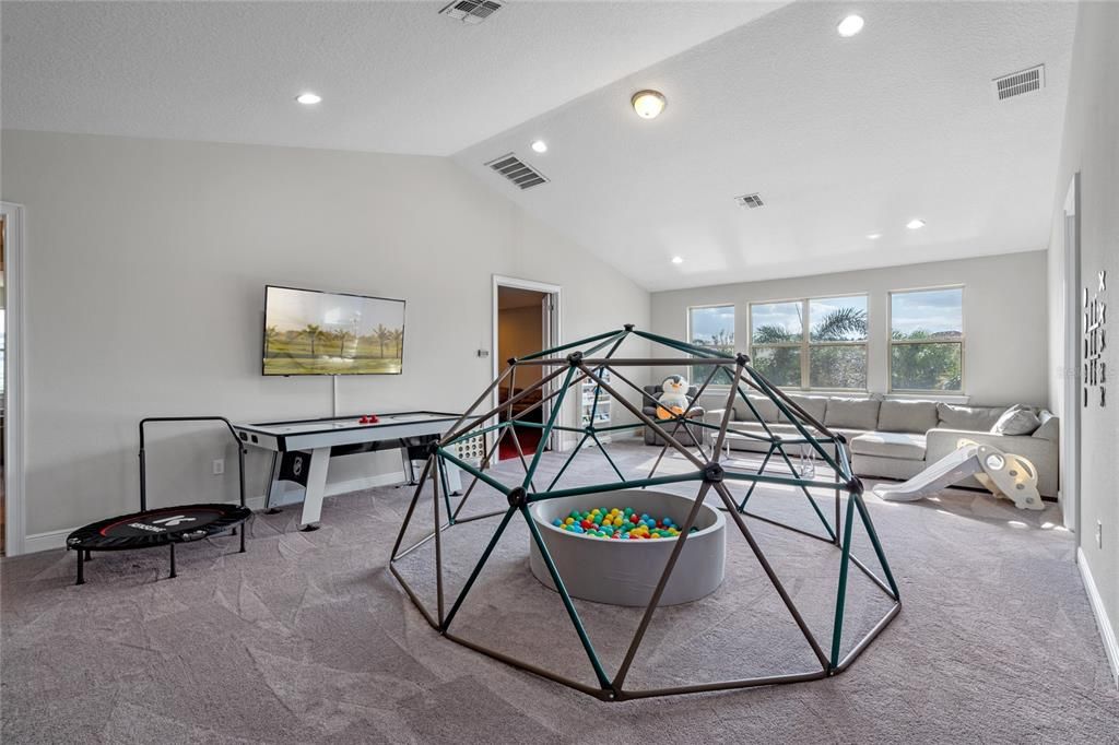 The expansive second floor loft is such a versatile space for this home. Imagine a game room, home school area or extra party space.