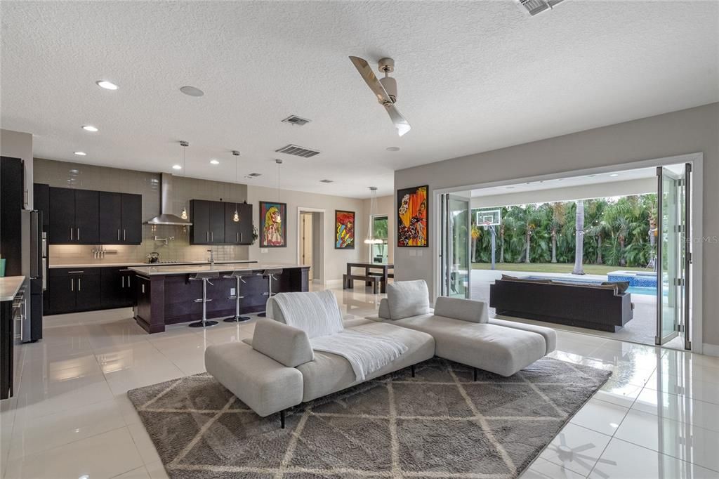 The living room/kitchen/breakfast area is open floorplan for ease of entertaining.