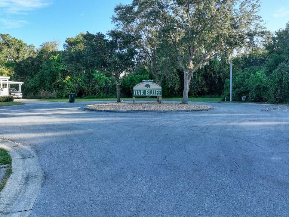 Community Sign with lot behind