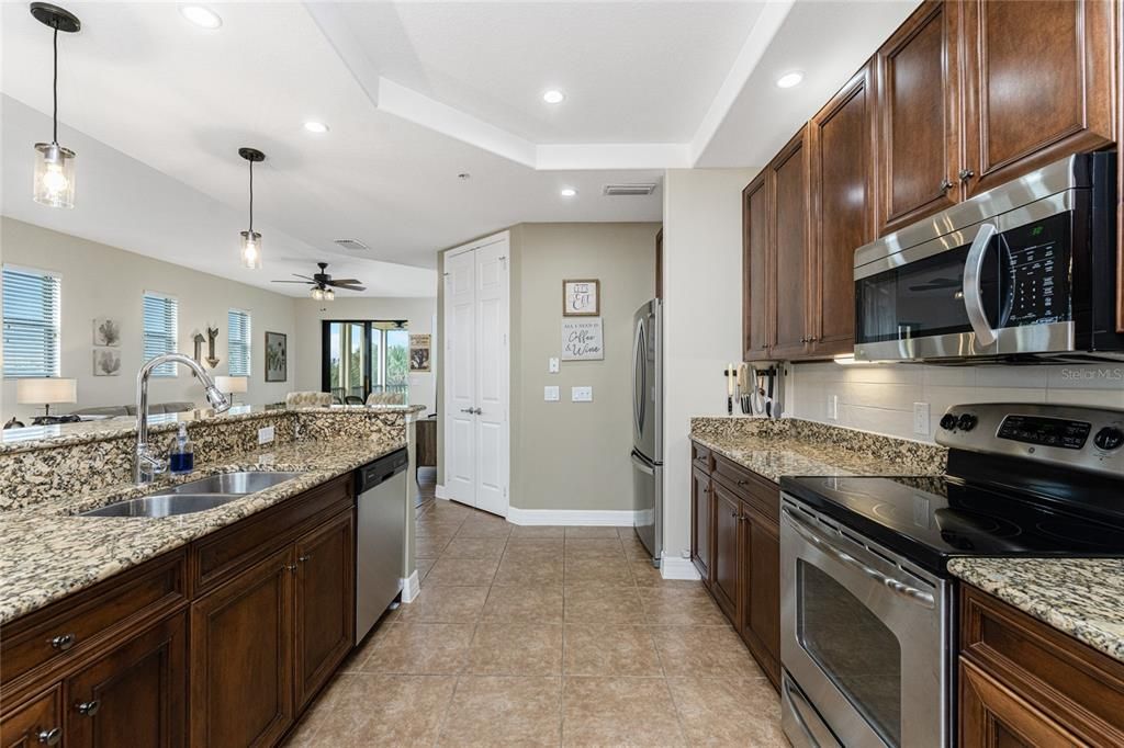 Expansive galley kitchen with closet pantry