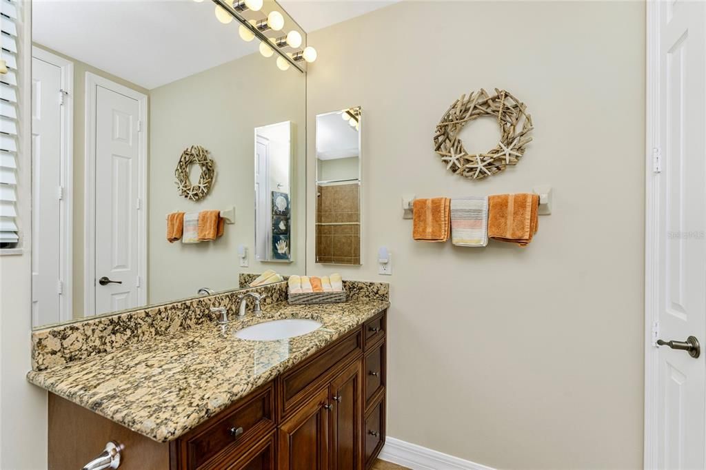 Beautiful guest bathroom to match this condo elegant exterior