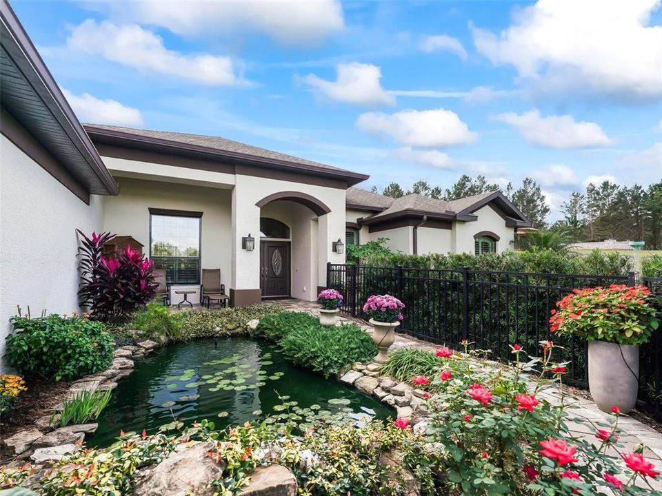 Courtyard Style Entry with Pond