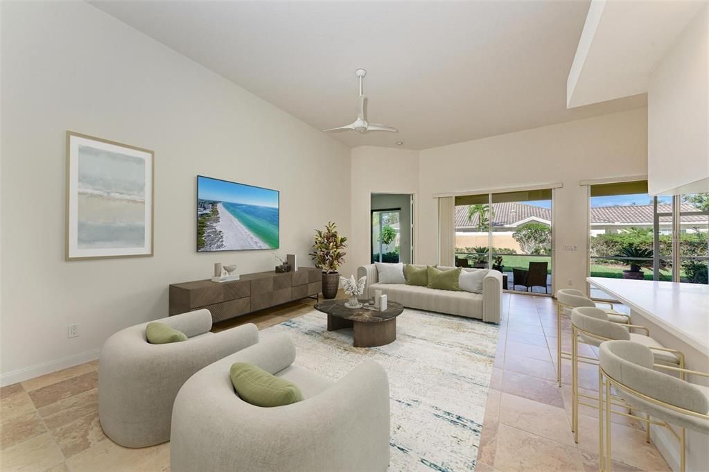 Oversized Family room is open to Kitchen and Dining bar/countertop. Virtually staged.