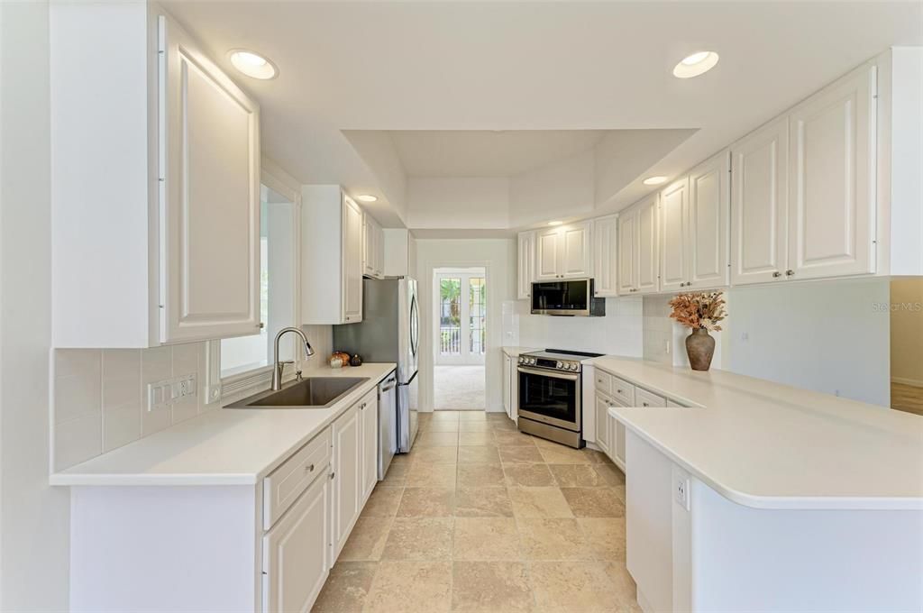 Plenty of storage space provided in this efficient Kitchen layout.