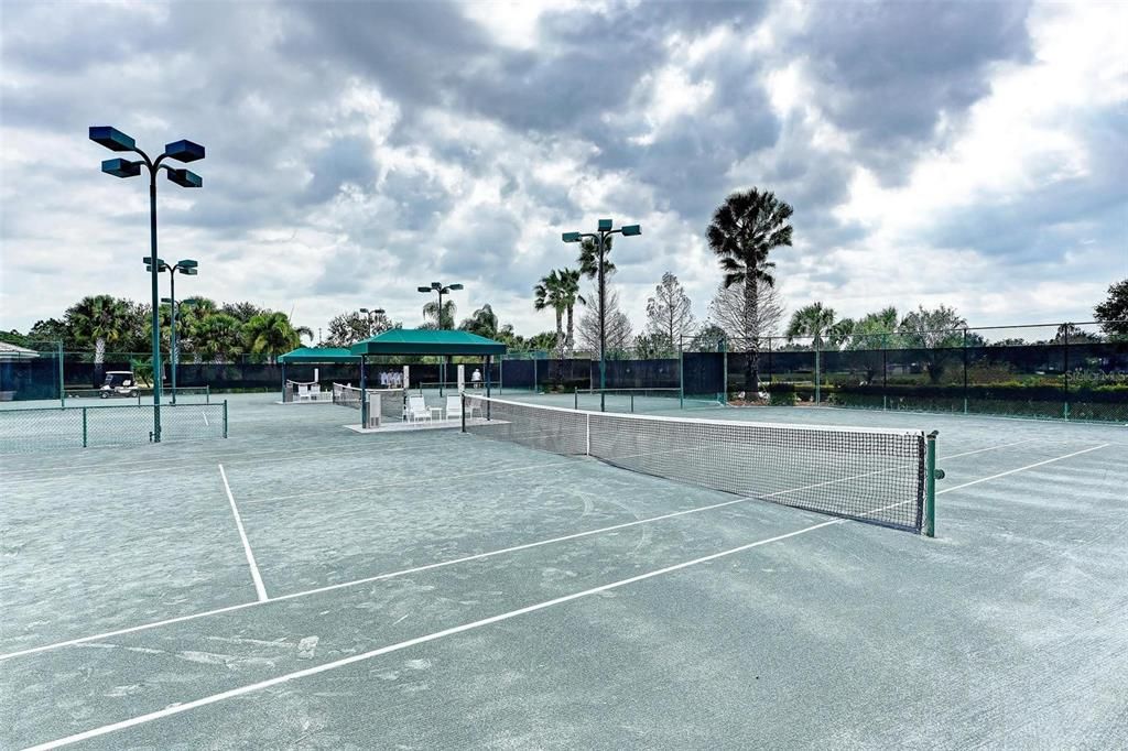 Lighted har tru tennis courts.