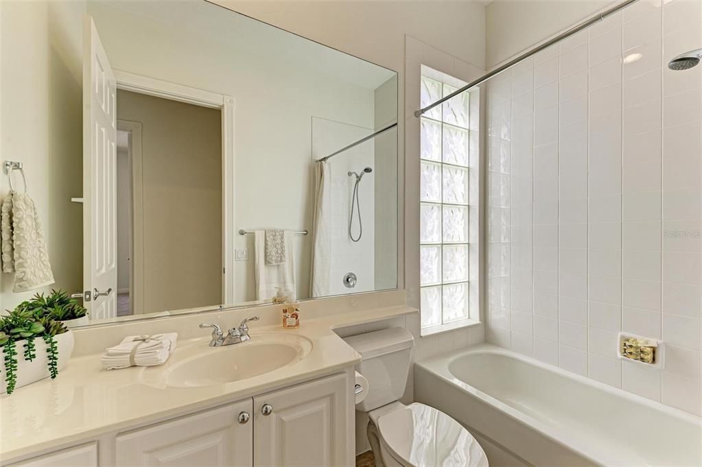 One of two Guest bathrooms ideally located between two Guest bedrooms.