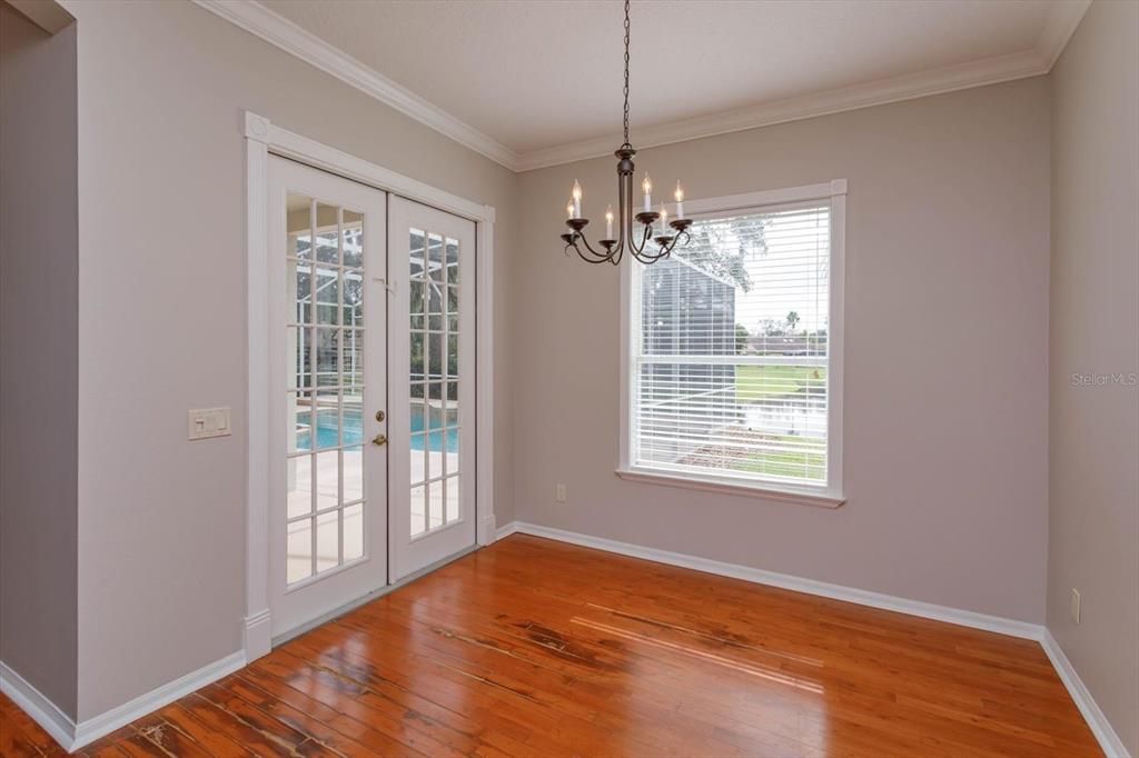 French doors to the covered porch from the breakfast nook