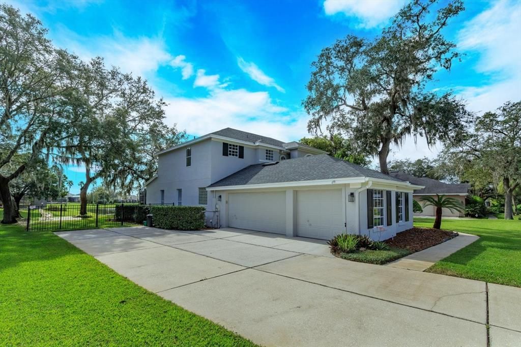 3 car side entry garage with extra long driveway